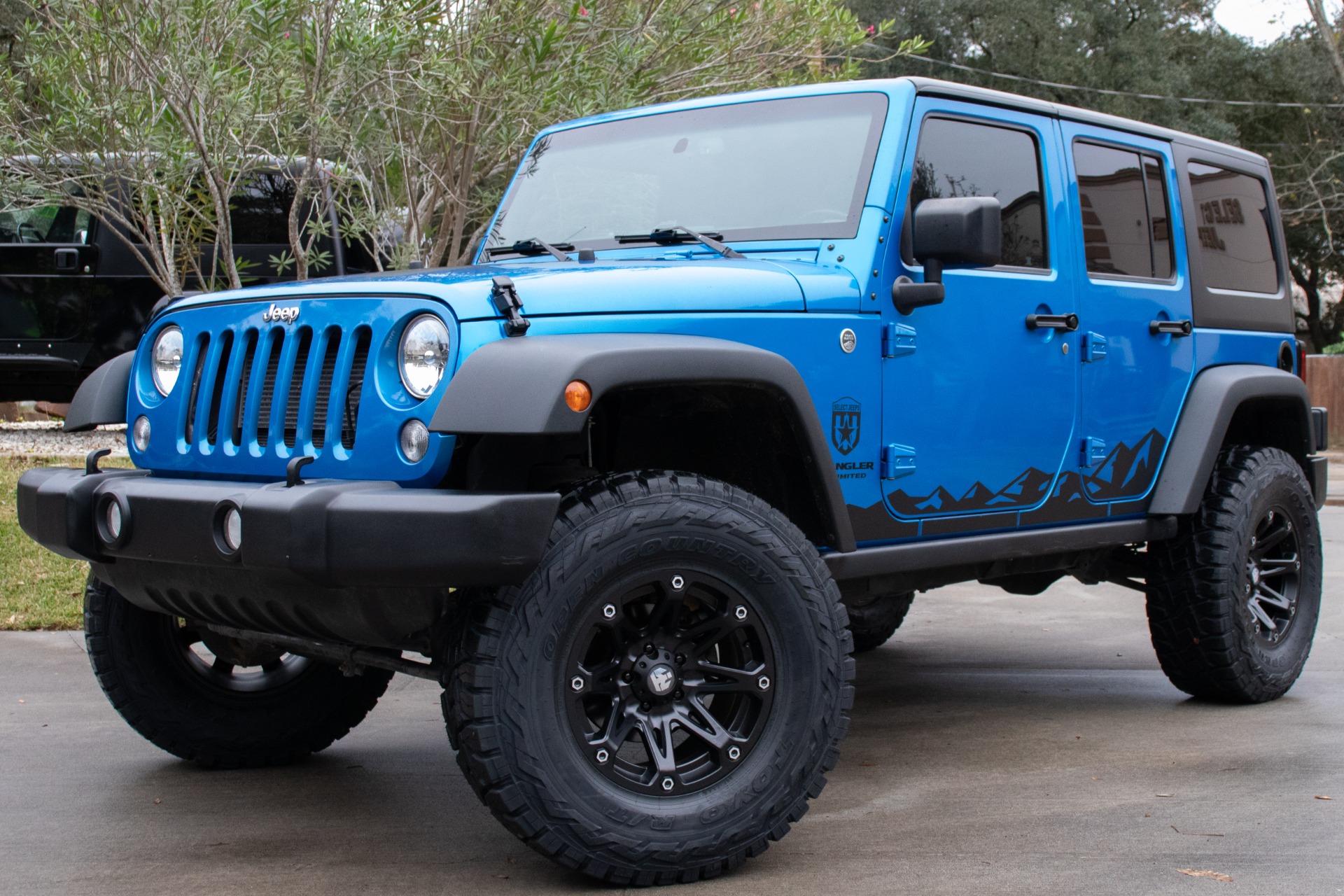 Used-2015-Jeep-Wrangler-Unlimited-4WD-4dr-Sport