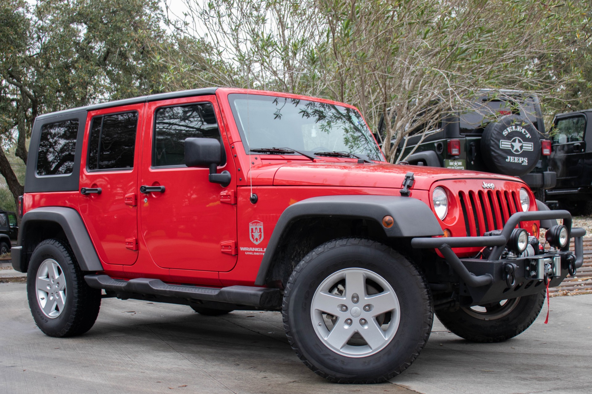 Arriba 63+ imagen 2009 red jeep wrangler