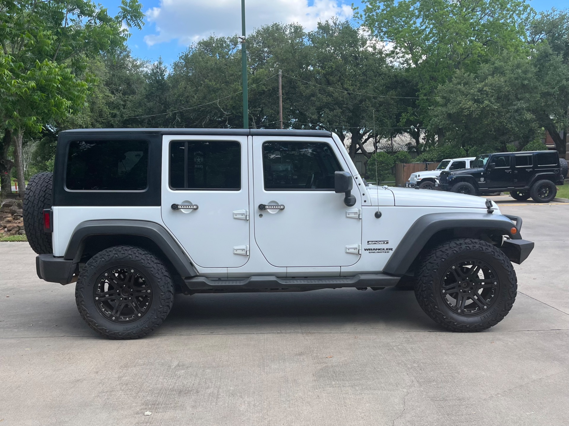 Used-2014-Jeep-Wrangler-Unlimited-Sport
