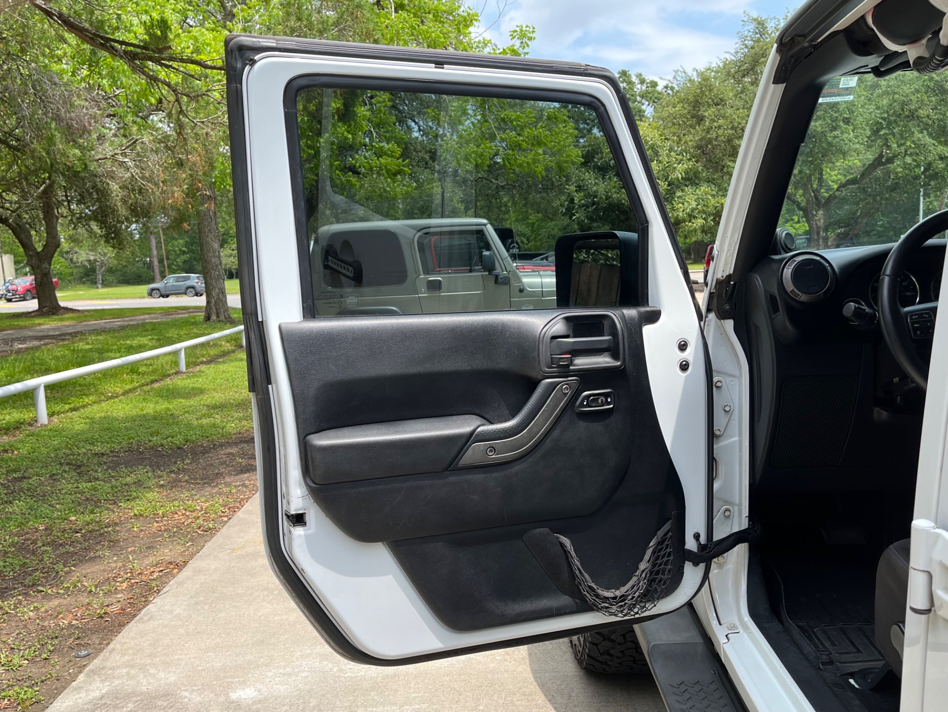 Used-2014-Jeep-Wrangler-Unlimited-Sport