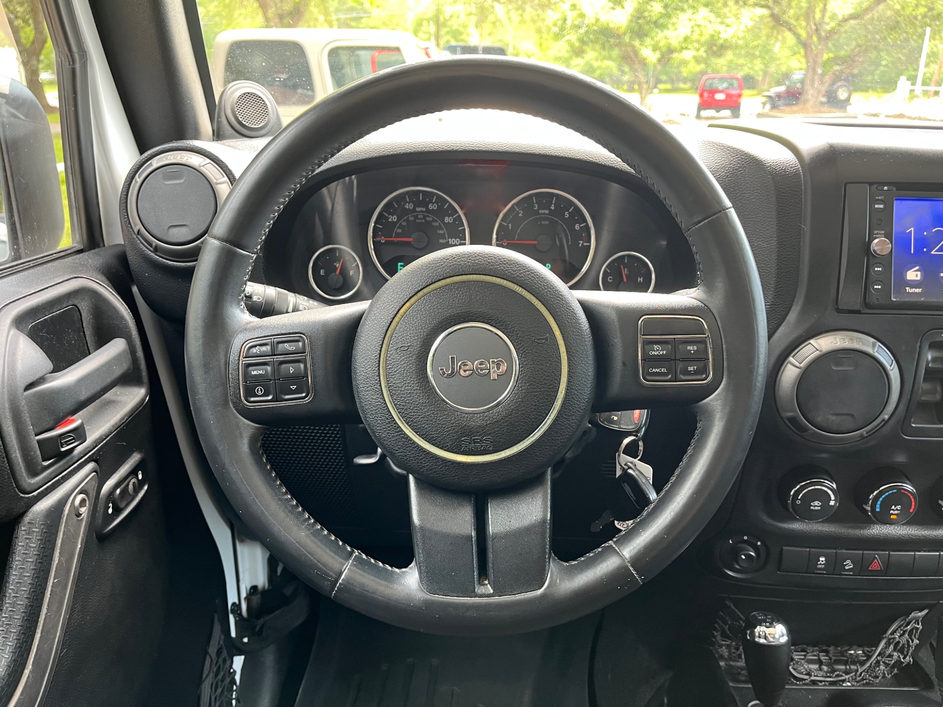 Used-2014-Jeep-Wrangler-Unlimited-Sport