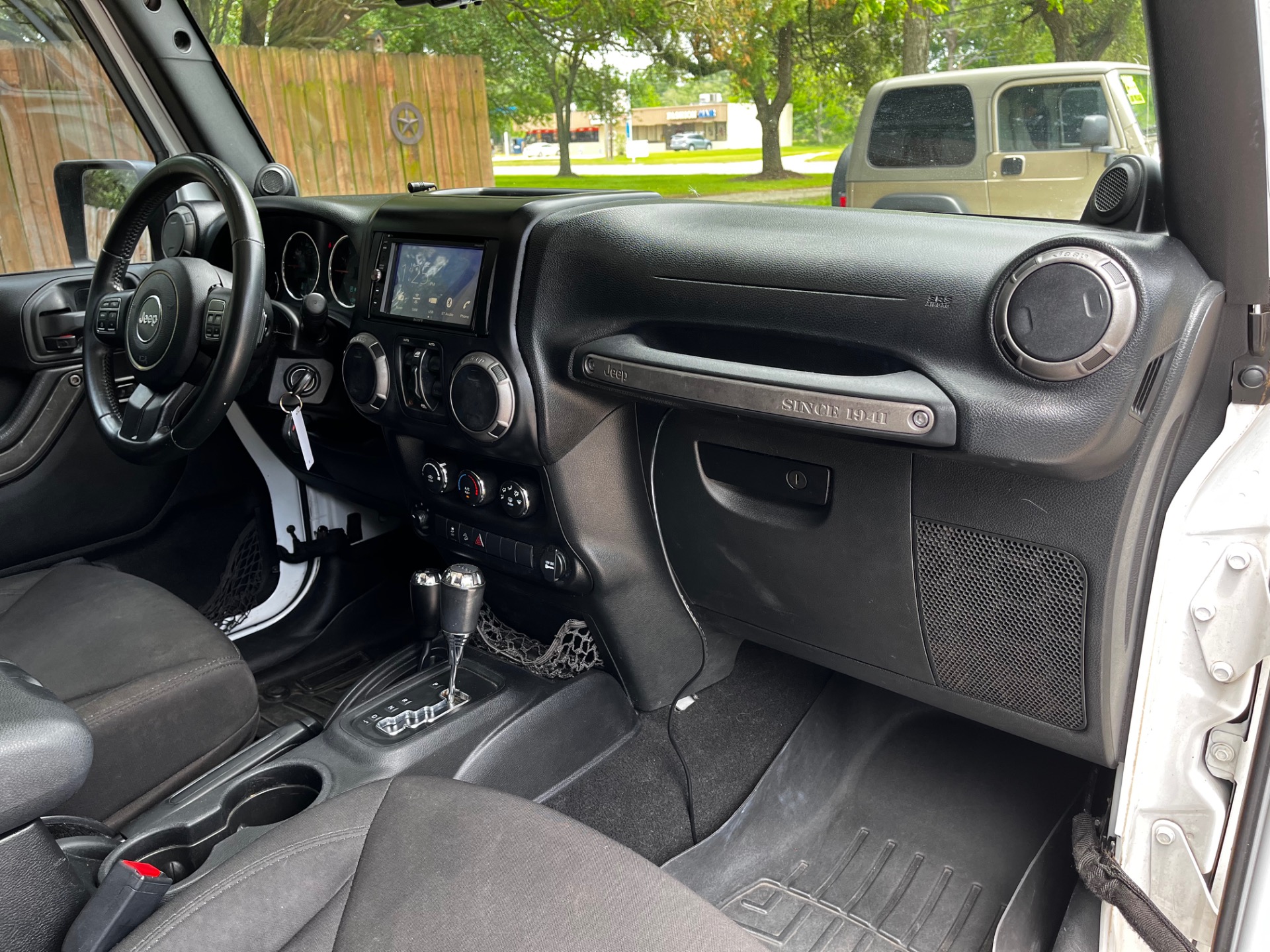 Used-2014-Jeep-Wrangler-Unlimited-Sport