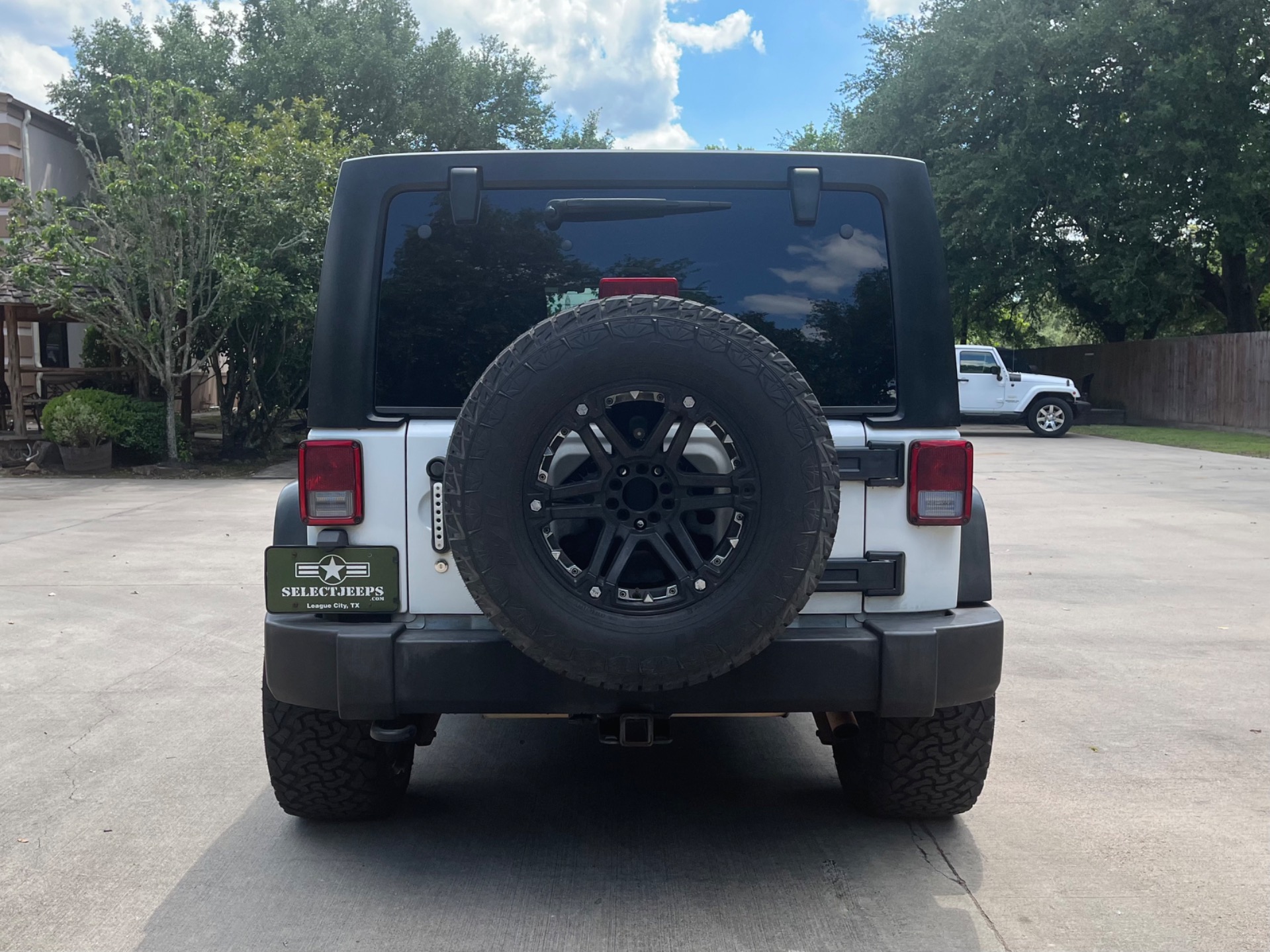 Used-2014-Jeep-Wrangler-Unlimited-Sport