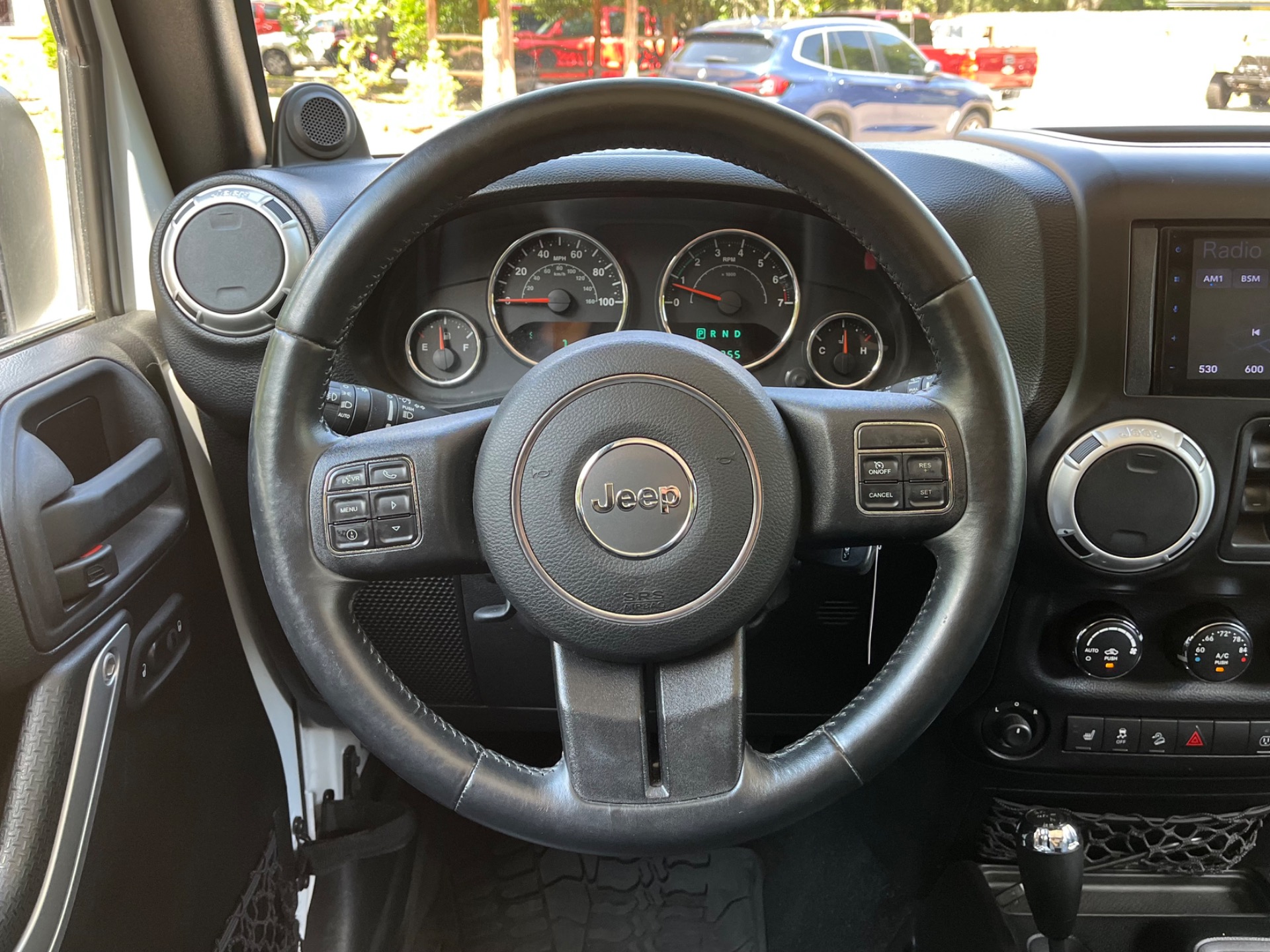 Used-2014-Jeep-Wrangler-Unlimited-Sahara