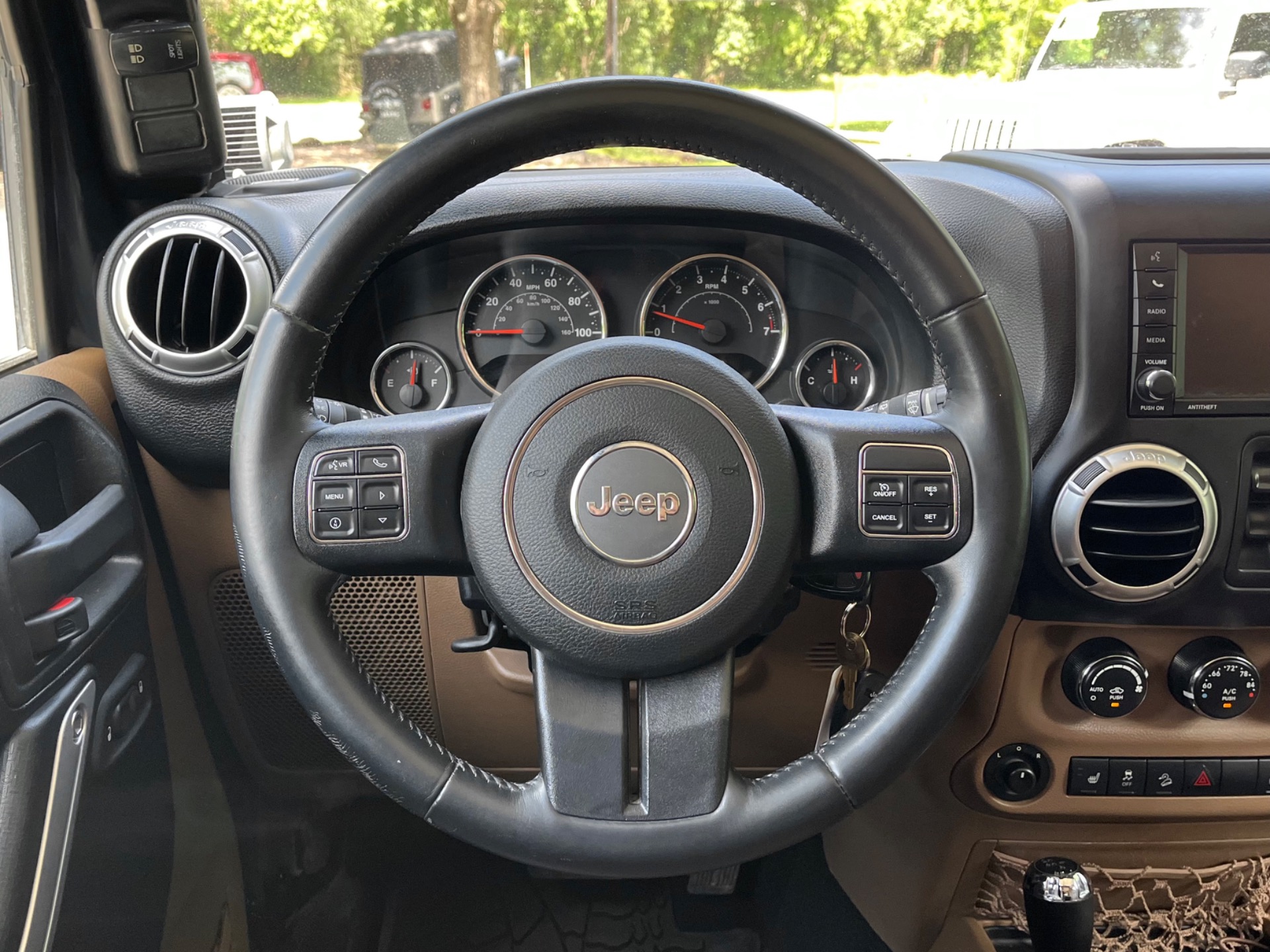 Used-2016-Jeep-Wrangler-Unlimited-Sahara