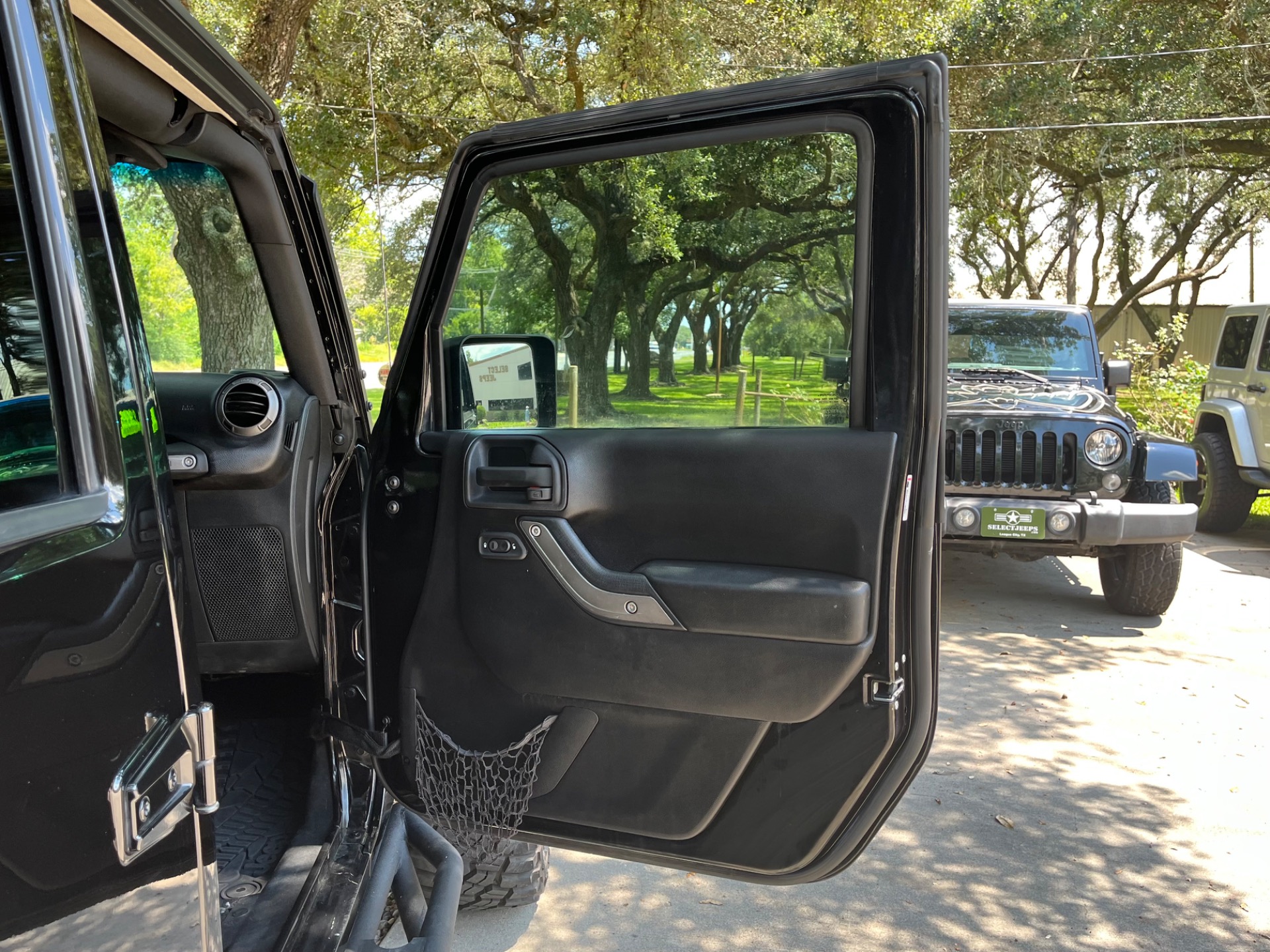 Used-2015-Jeep-Wrangler-Unlimited-Sport