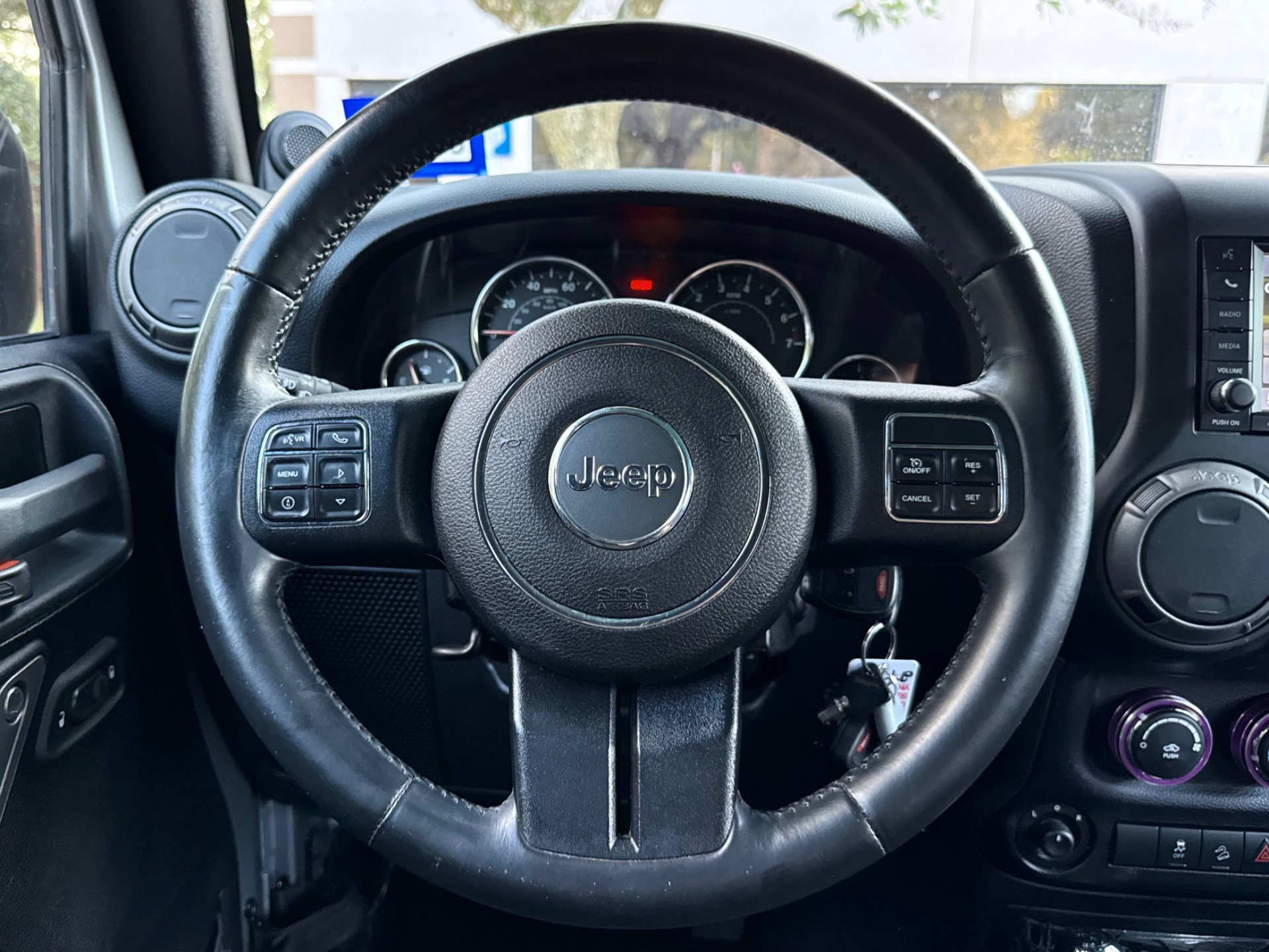 Used-2014-Jeep-Wrangler-Unlimited-Sport